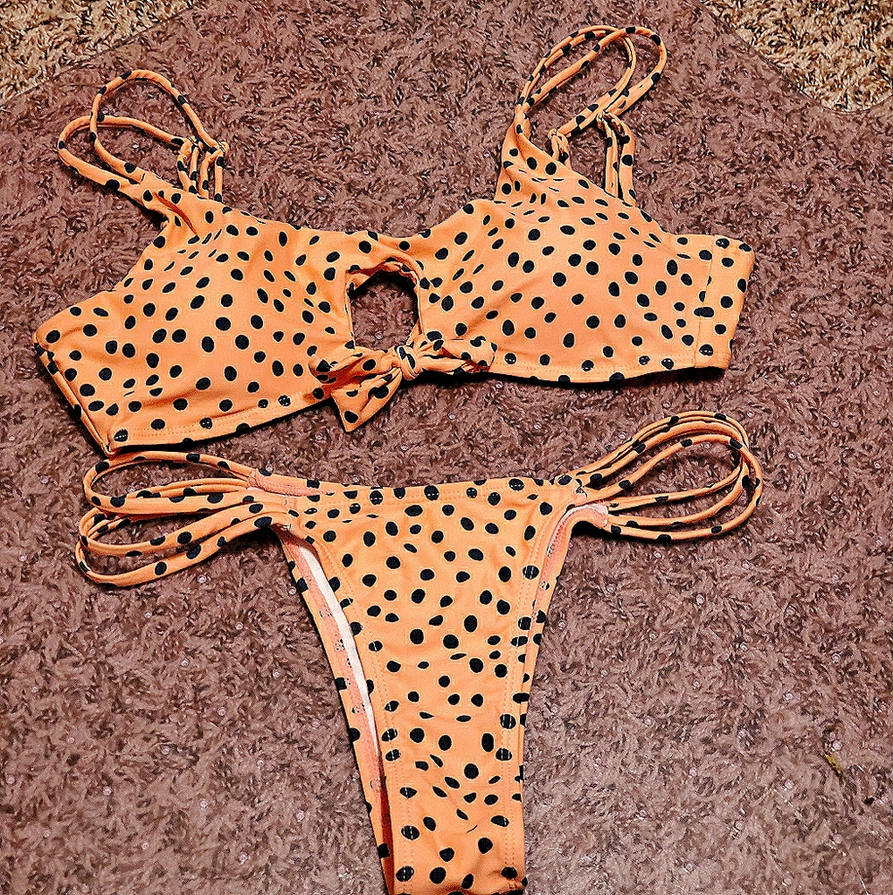 Medium light pink and navy polka dot bikini